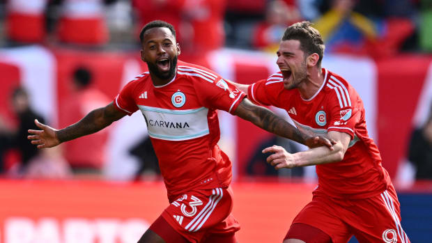 Mar 16, 2024; Chicago, Illinois, USA; Chicago Fire FC midfielder Kellyn Acosta (23) celebrates with forward Hugo Cuypers (9) after scoring a goal against CF Montreal on a long kick during the second half at Soldier Field.